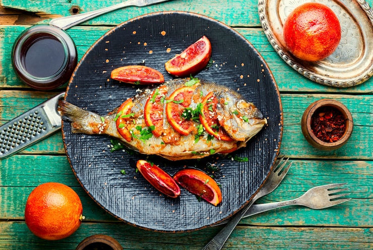 Foto pesce dorado arrosto