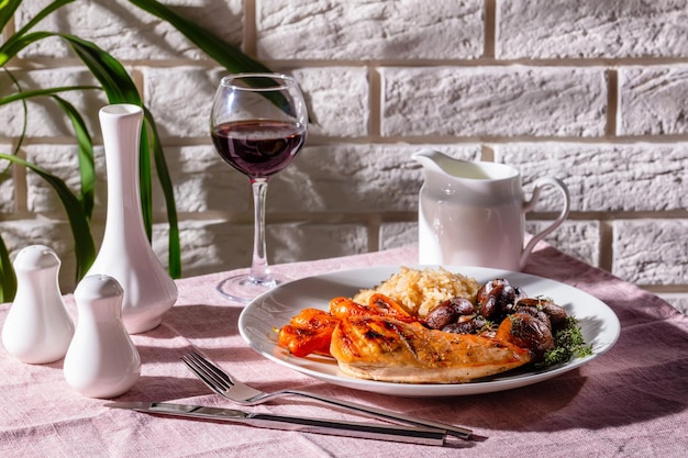 Petto di pollo con carote e riso