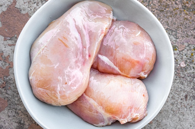petto di pollo fresco crudo carne di pollame fresco pasto sano dieta alimentare spuntino copia spazio cibo sfondo