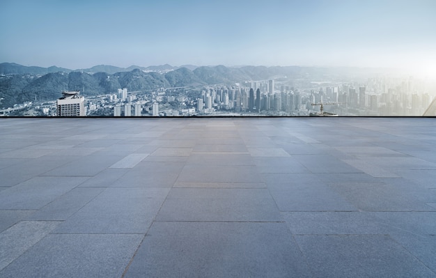 Piastrelle per pavimenti quadrate e skyline dell'edificio urbano di Chongqing