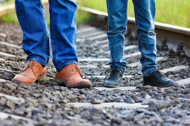 Piedi scarpe da cowboy di padre e figlio