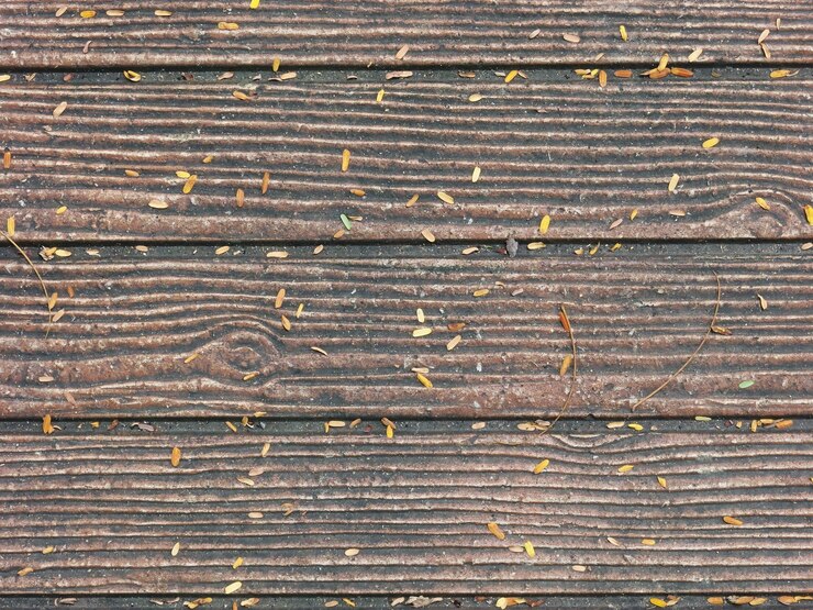 Pietra del mattone strutturata sulla terra.