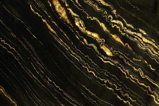 Pietra naturale marmo nero con strisce giallo brillante chiamato Quarzite Portoro Gold.