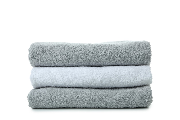 Pila di asciugamani isolati su bianco
