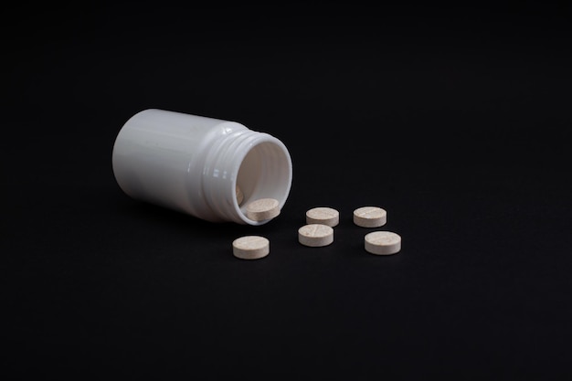 Pillole vitamine medicina macro foto su sfondo