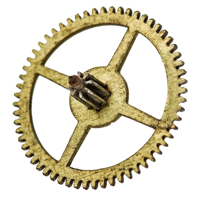 Pinione di un vecchio meccanismo d'orologio isolato su sfondo bianco
