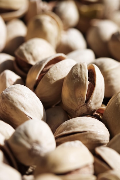 Pistacchi biologici al sole cibo sano e snack sfondo