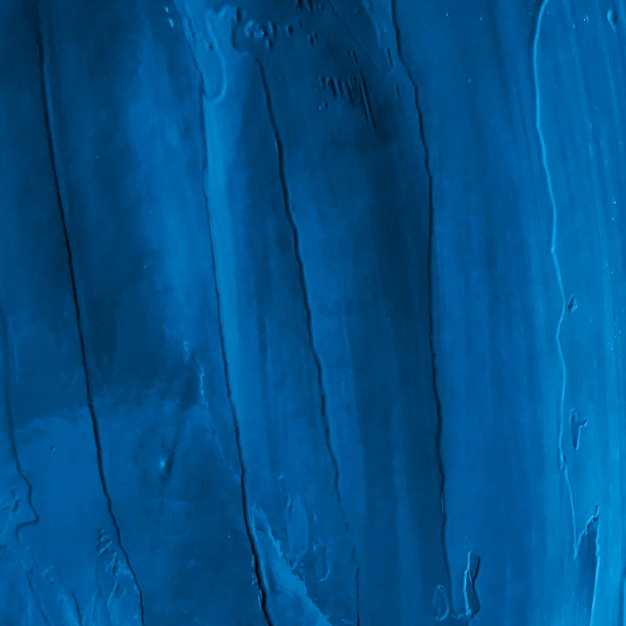 Pittura acrilica blu lucida isolata su sfondo bianco Trama del tratto di pennello