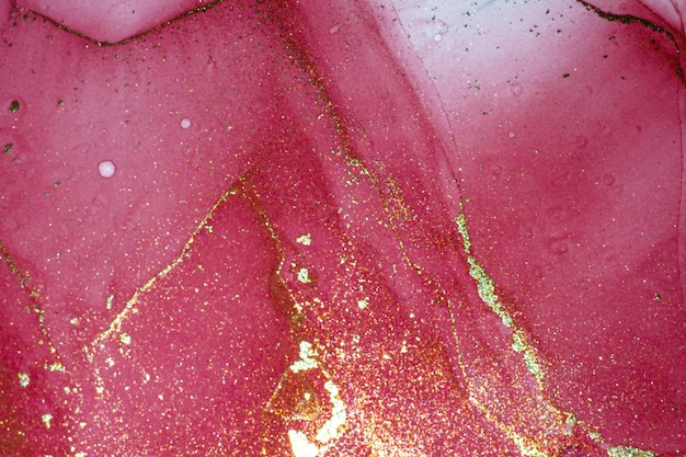 Pittura ad alcool disegnata a mano di sfondo fluido brillante brillante astratto con striature dorate a inchiostro liquido per la progettazione di fondali ad alta risoluzione