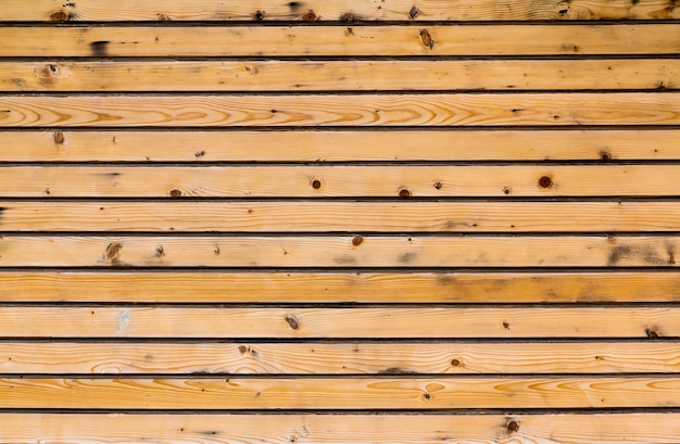 Plance di legno gialle per fondo. Consistenza naturale.