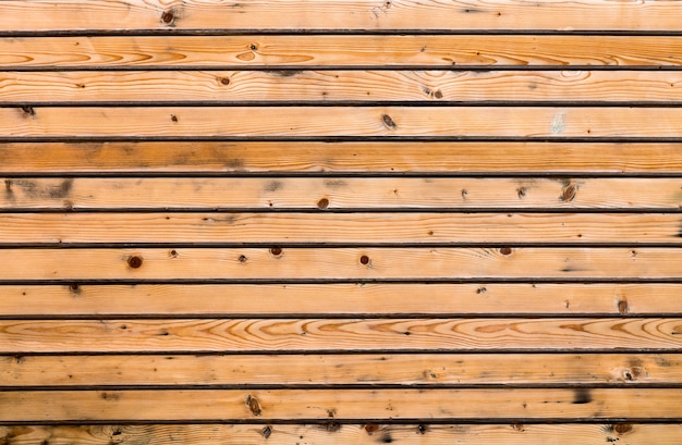 Plance di legno gialle per fondo. Consistenza naturale.