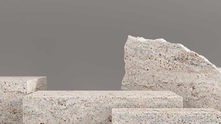 Podio premium su sfondo grigio con rami di piante foglie e pietre naturali rendering 3d