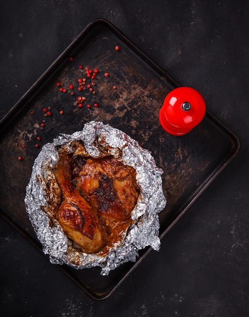 Pollo al cartoccio con peperoni rossi