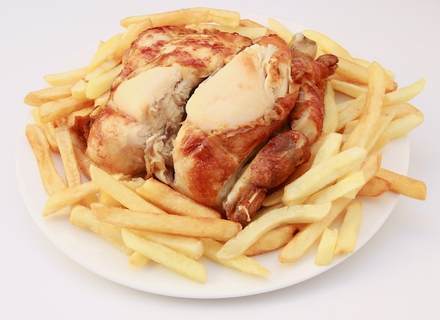 pollo arrosto con patatine fritte