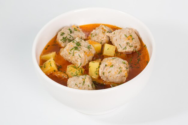 Polpette con patate arrosto e verdure