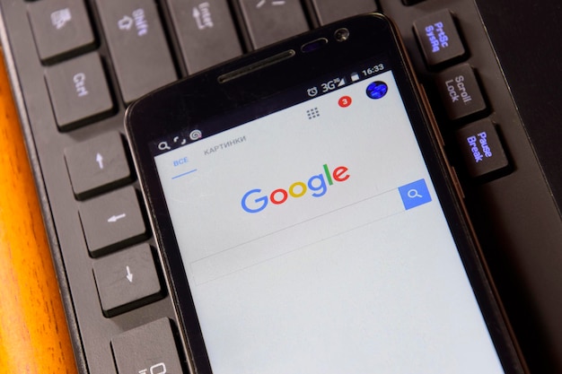 poltavskaya village russia december 3 2016 smartphone with google search system on the keyboard background finding information with the help of google