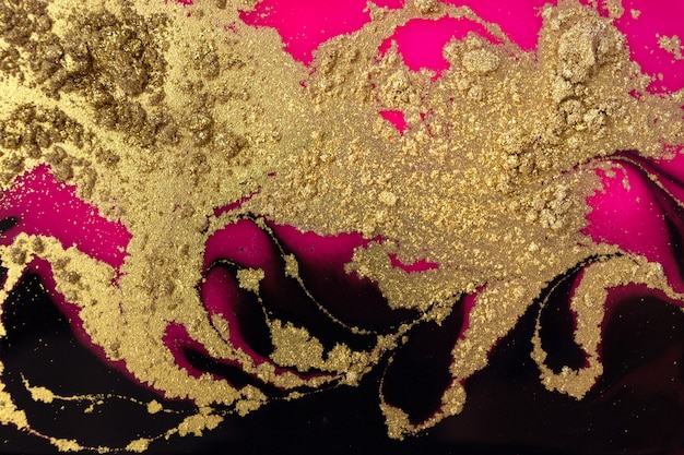 Polvere d'oro, sfondo nero e rosa. Trama scintillante d'oro.