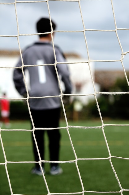 Portiere sul campo di calcio