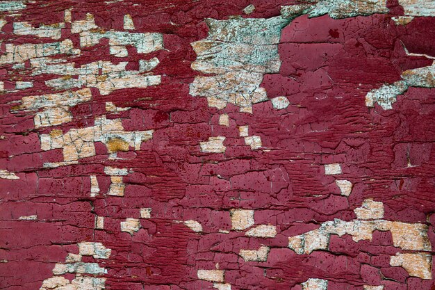 Primo piano d'annata del fondo, spazio della copia. fondo di legno dipinto rosso. Struttura in legno.