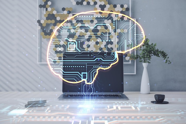 Primo piano del desktop di design creativo con laptop e ologramma cerebrale creativo su sfondo sfocato Tecnologia futura della scienza e concetto di intelligenza artificiale Doppia esposizione