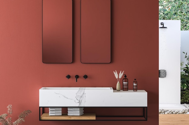 Primo piano del lavabo in marmo bianco con due specchi appesi alla parete rossa, armadio minimale con rubinetto