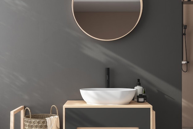 Primo piano del lavandino bianco con specchio ovale appeso a una parete blu scuro Armadio moderno con rubinetto nero in bagno minimalista con rendering 3d