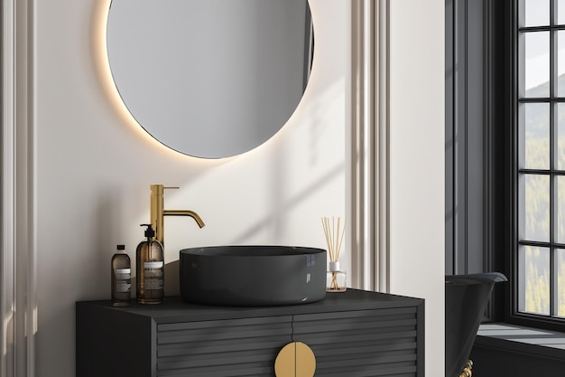 Primo piano del lavandino di lusso con specchi ovali, appeso a una parete grigia, armadio moderno con rubinetto d'oro