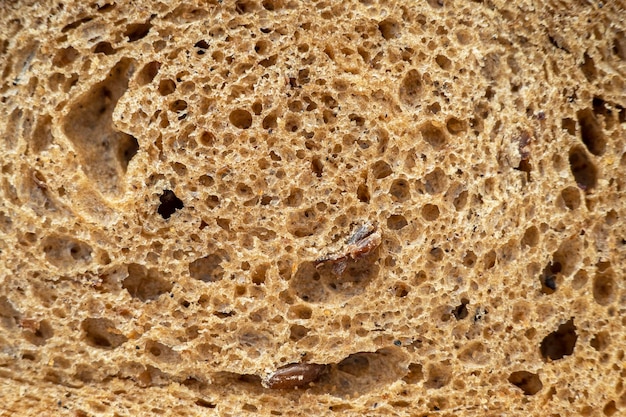 Primo piano della mollica di pane macro dettaglio della superficie del pane come trama o sfondo