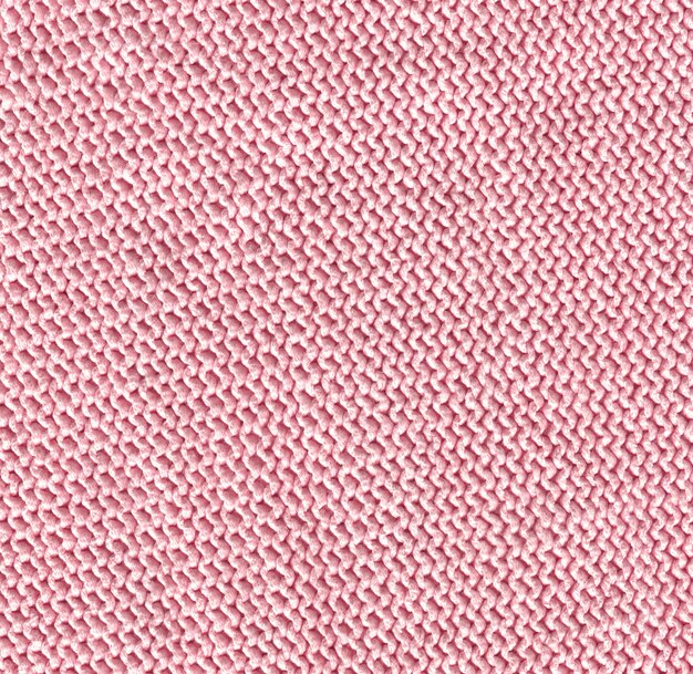 Primo piano della superficie della trama del magneta a maglia Sfondo dalla morbida coperta merino lilla