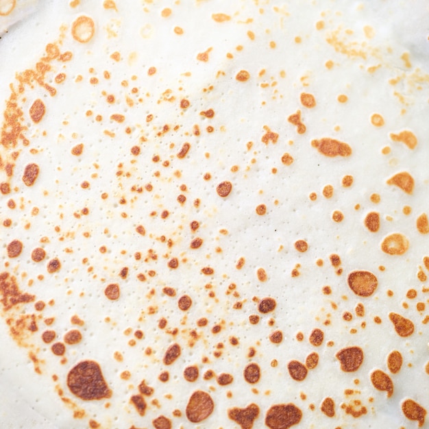 Primo piano di delizioso appetitoso pancake di farina sfondo