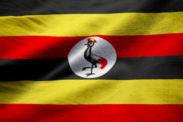 Primo piano di Ruffled Uganda Flag, Uganda Flag Blowing in Wind