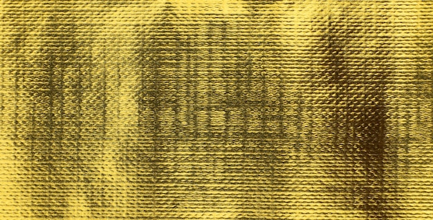 Primo piano di struttura dell'oro, fondo iridescente lucido metallico giallo, carta da parati dell'oro