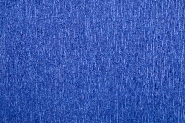 Primo piano sfondo texture carta crespa dai toni blu