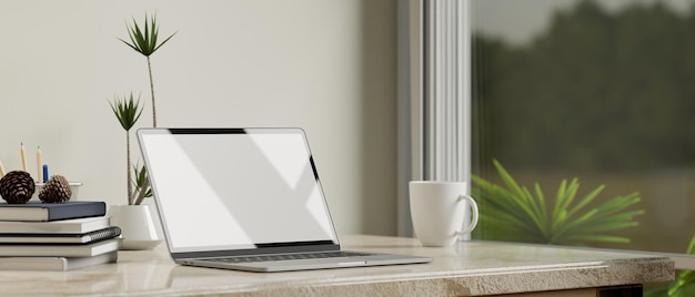 Primo piano Spazio di lavoro bianco moderno con mockup di laptop