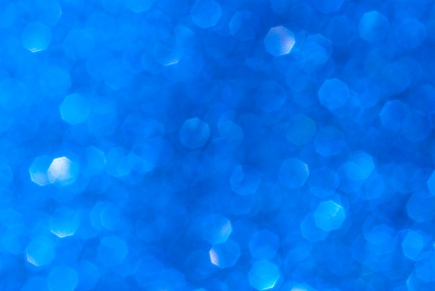 Priorità bassa blu astratta del bokeh da glitter