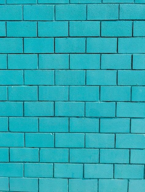 Priorità bassa blu del muro di mattoni