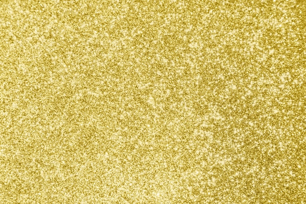 Priorità bassa chiara astratta del bokeh della scintilla di scintillio dell'oro