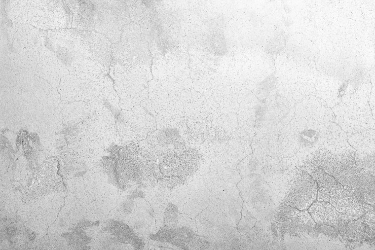 Foto priorità bassa del grunge della parete di cemento in bianco e nero