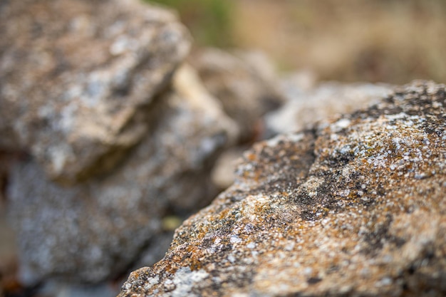 Priorità bassa del primo piano di struttura di pietra. Macro minerale della superficie rocciosa