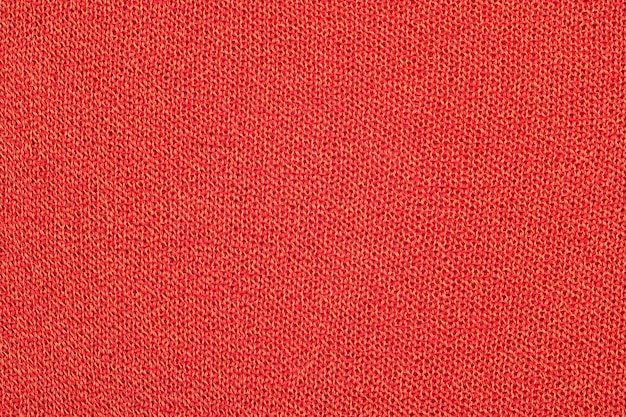 Priorità bassa di struttura del tessuto a maglia arancione
