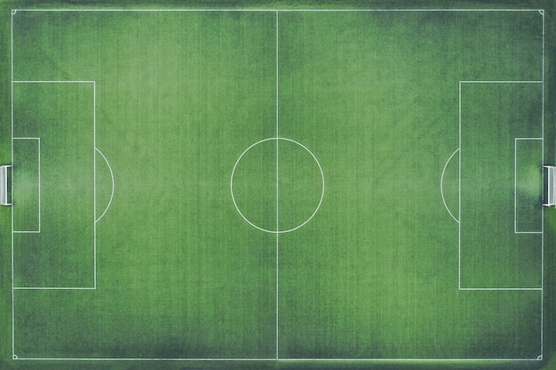 Priorità bassa di vista superiore del campo di calcio verde. Concetto di campionato del mondo