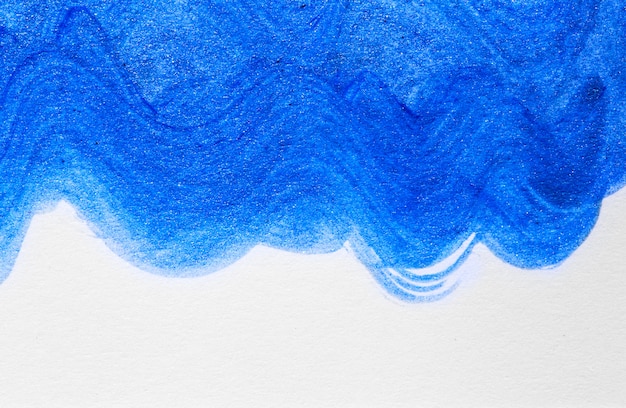 Priorità bassa disegnata a mano blu della pittura acrilica dell'onda astratta