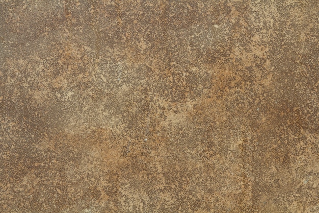 Priorità bassa grigia del grunge o dell'annata di cemento naturale o vecchia struttura di pietra come retro parete del reticolo.