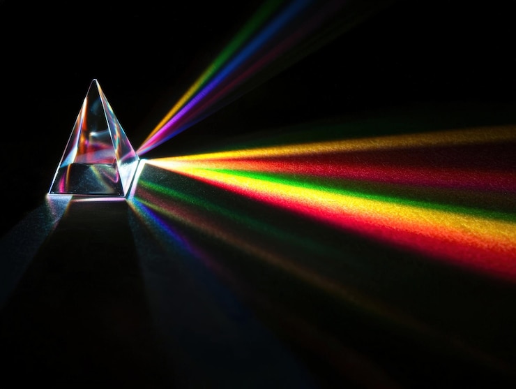 Photo prism refracts light into rainbow