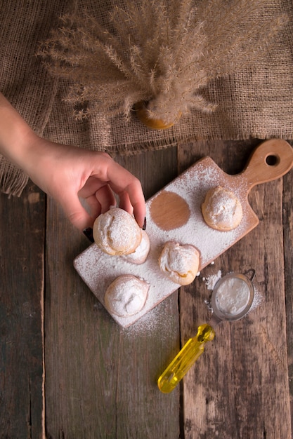 Profiteroles con zucchero a velo