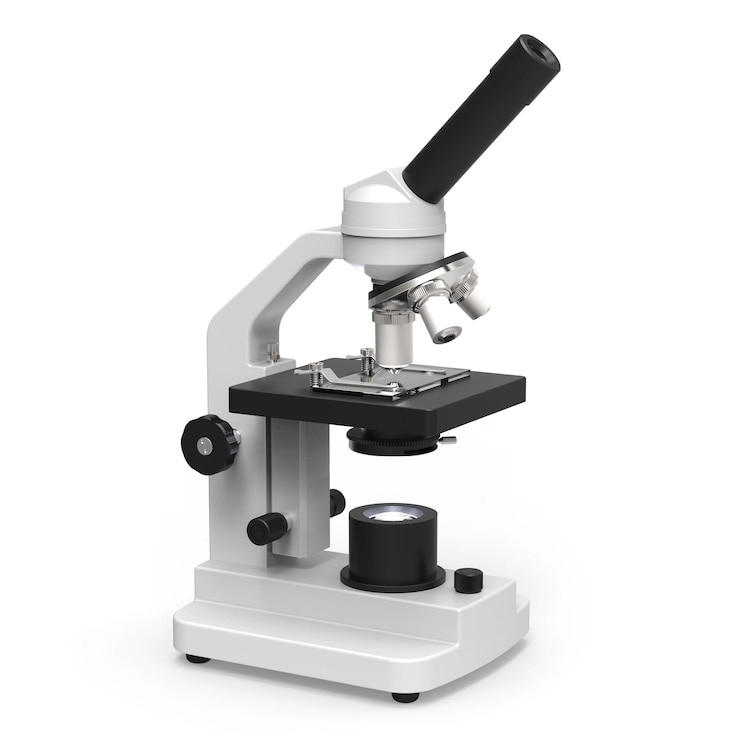 Foto prossimo piano del microscopio sullo sfondo bianco