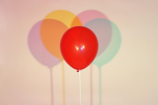 Prossimo piano del palloncino sullo sfondo rosa