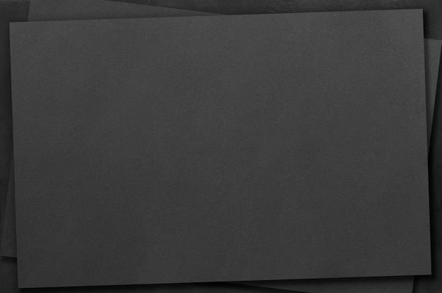 Prototipi rettangolari neri su uno sfondo di cemento scuro Elementi di design o portfolio