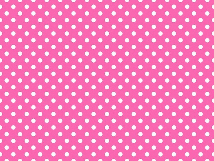 Foto punti bianchi texturizzati su uno sfondo rosa caldo
