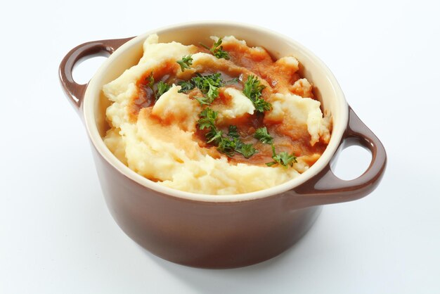 Purè di patate in vaso isolato su bianco